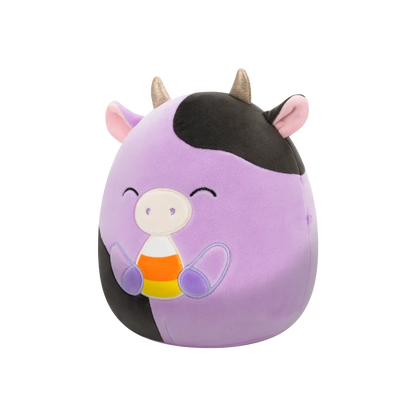 squishmallows-alexie-the-purple-cow-with-closed-eyes-holding-candy-corn-20-cm-b6/b606ba6f0090225f225c6311a837ffa25de5f1bb